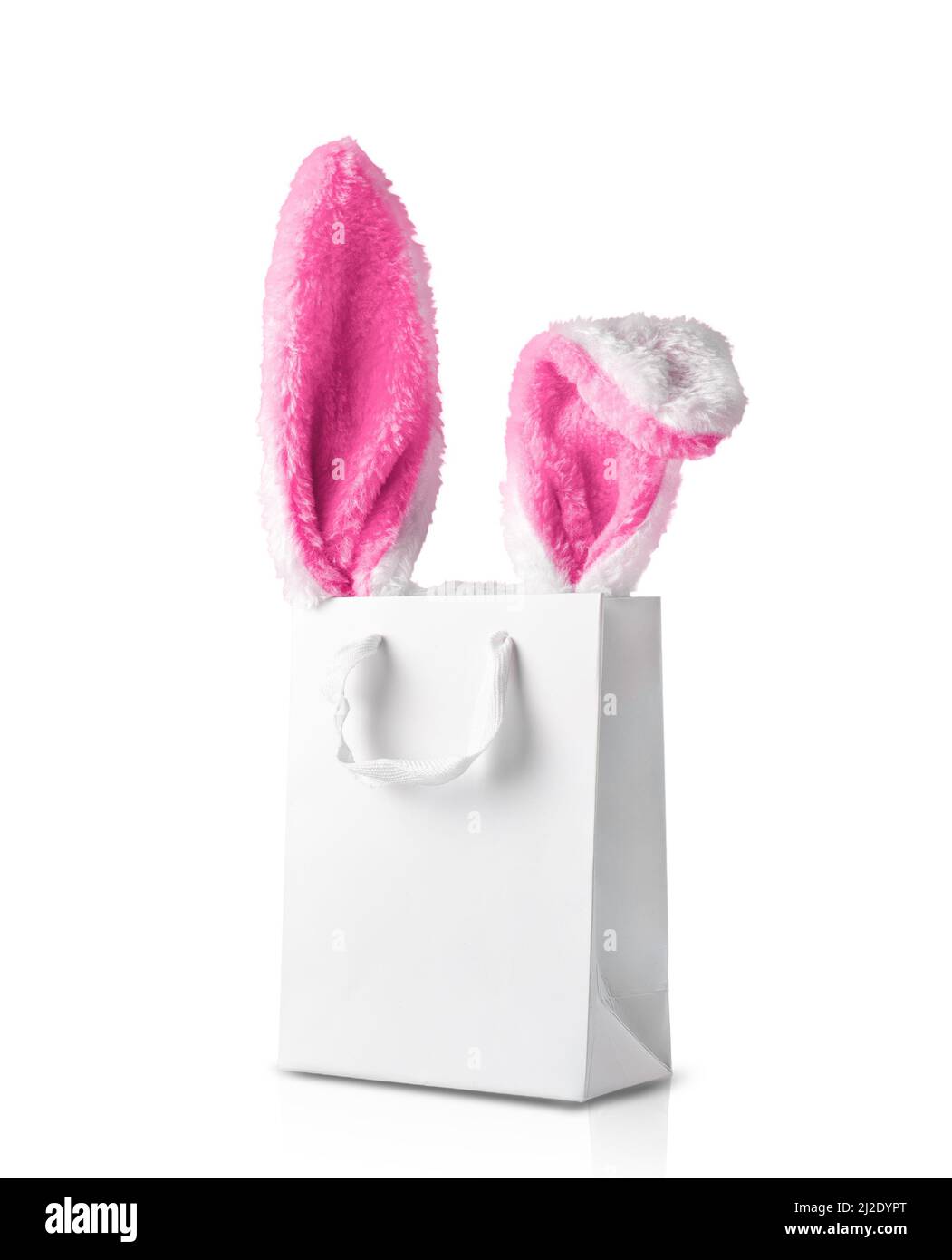 foto isolato su sfondo bianco. Il concetto di shopping online per Pasqua, acquisti e vendita per le vacanze. Borsa regalo con orecchie conigliate Foto Stock