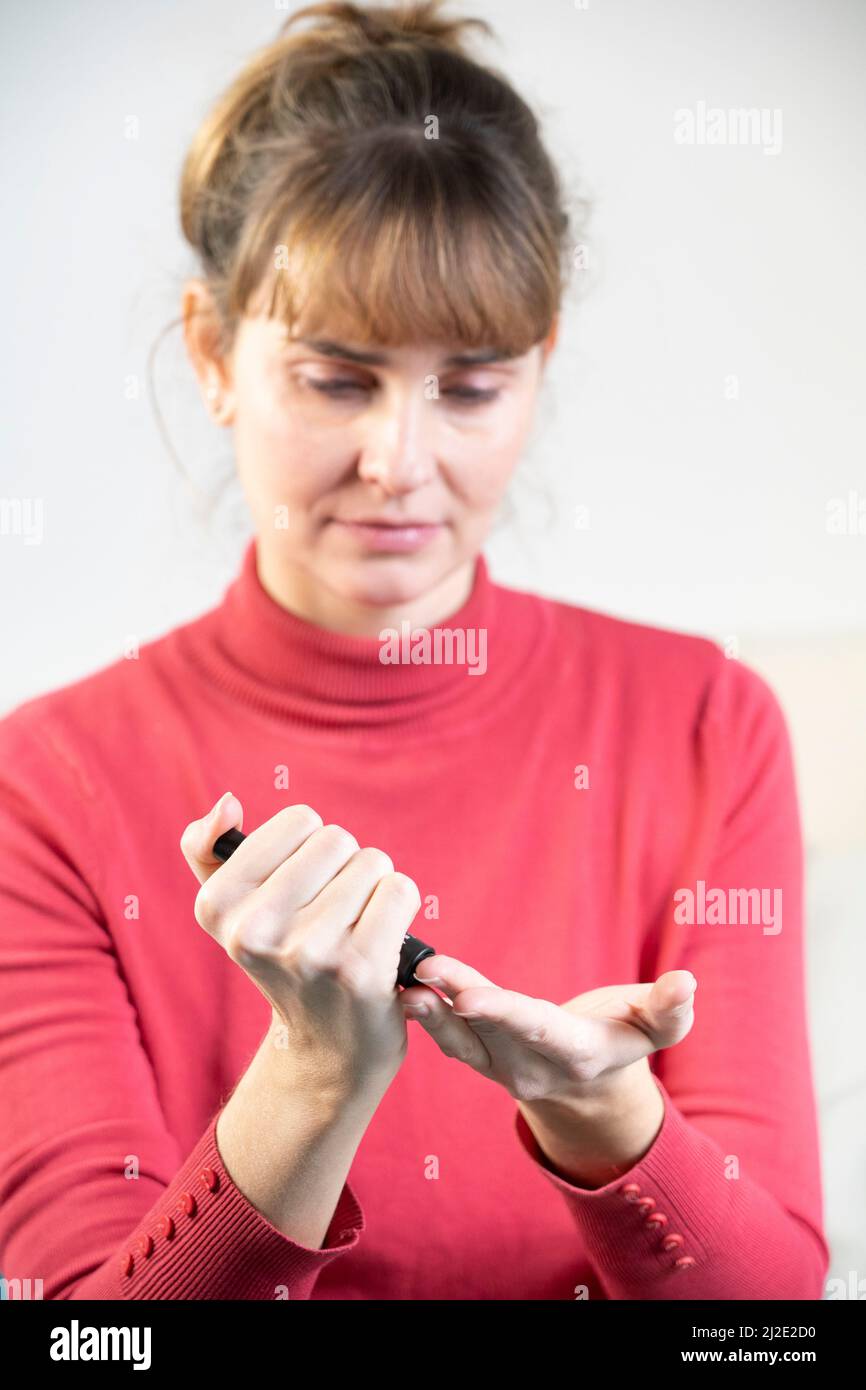 Misura del diabete Foto Stock