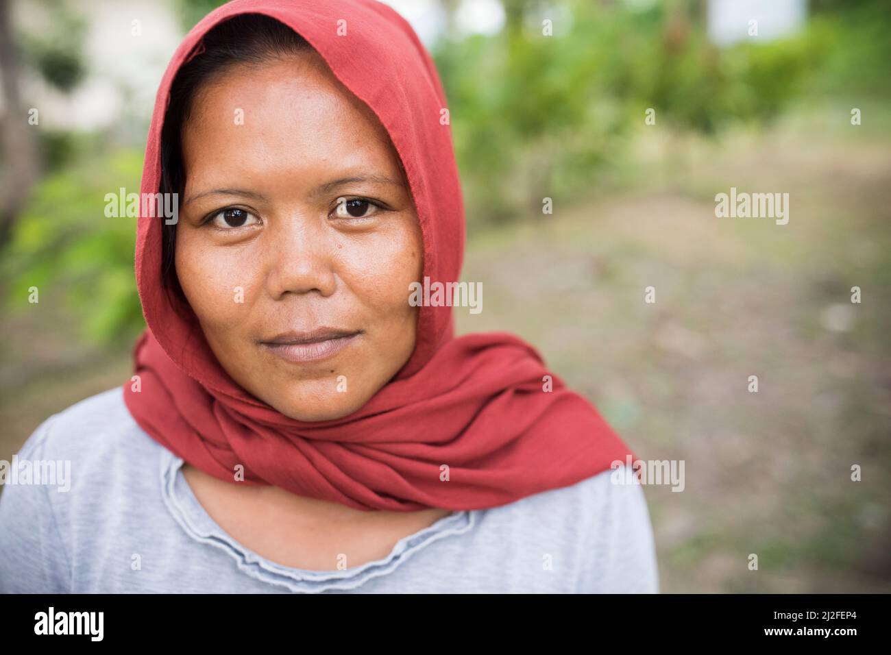 Ritratto di una donna sull'isola di Sulawesi, Indonesia, Asia. Foto Stock