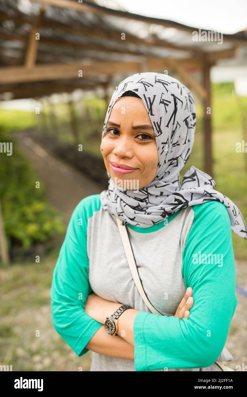 Ritratto di una donna sull'isola di Sulawesi, Indonesia, Asia. Foto Stock