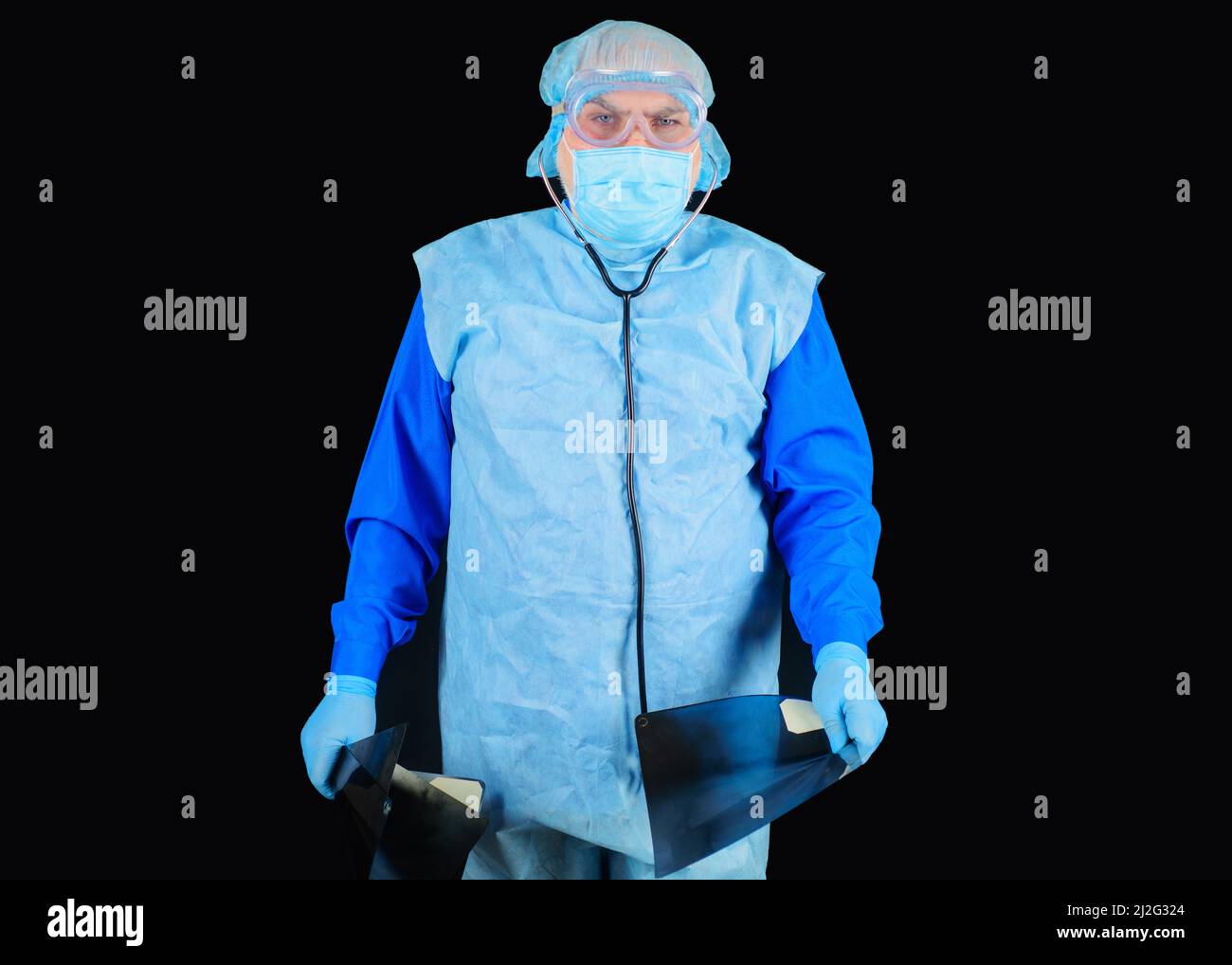 Radiologia del medico con pellicola radiogena o immagine del paziente in ospedale. Foto Stock