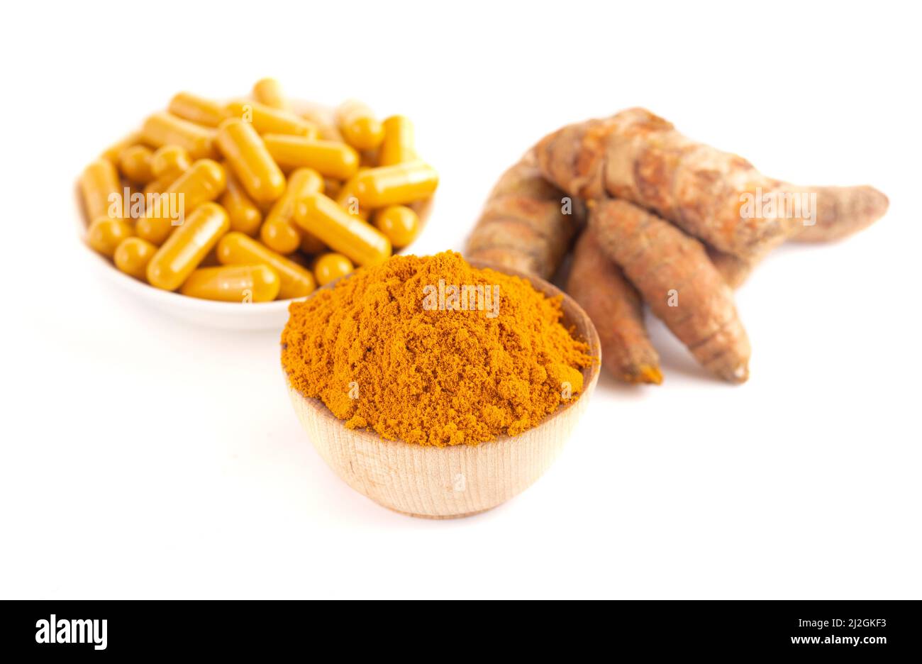 Curcuma in forma di capsula isolato su sfondo bianco Foto Stock