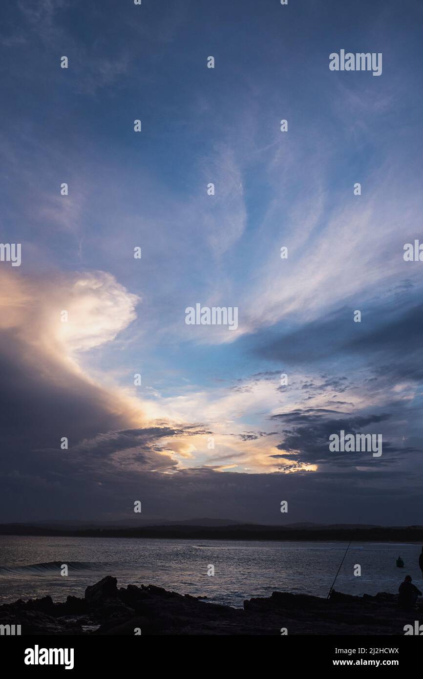 Ha catturato un tramonto al largo di Bar Beach a Merimbula, NSW, Australia Foto Stock