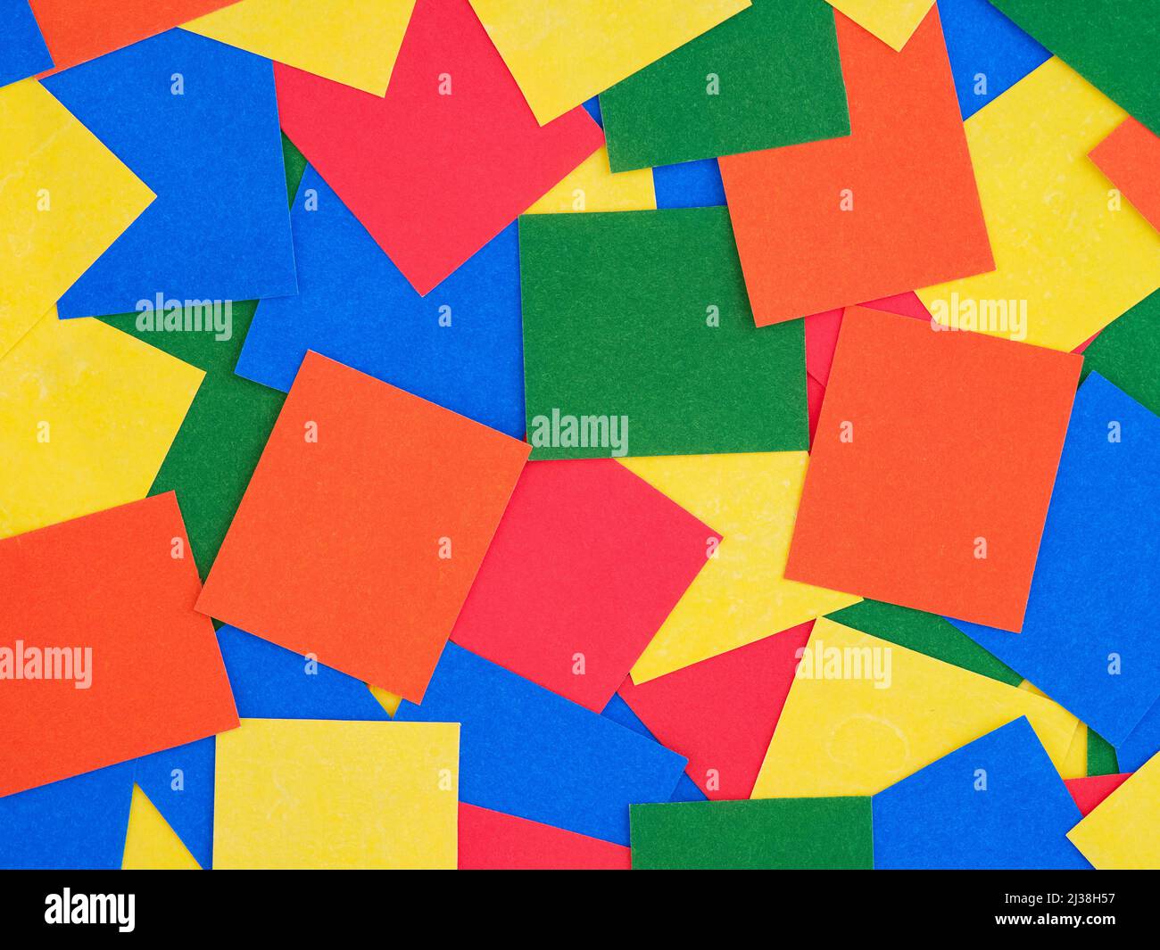 Sfondo di pezzi di carta rettangolari multicolore. Full frame. Foto Stock
