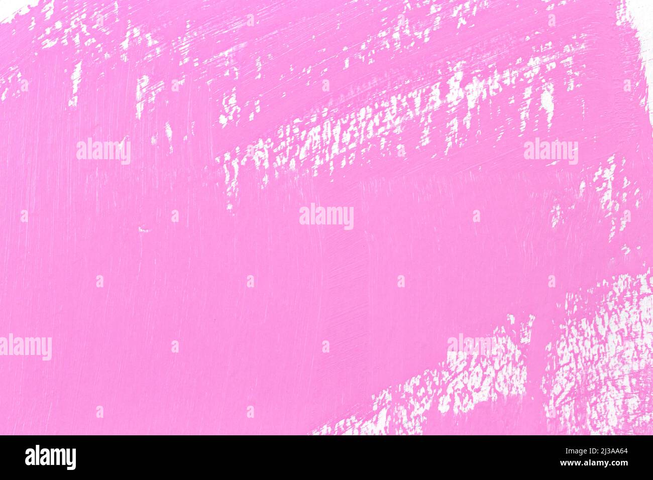 Pennello rosa sulla parete bianca per il design nel tuo concetto di lavoro. Foto Stock