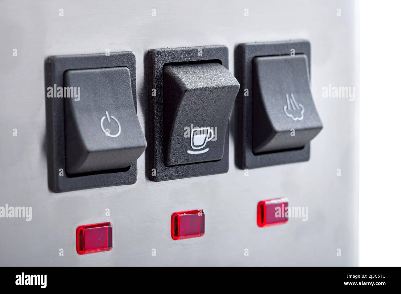 Pulsanti in plastica nera con accensione per preparare il caffè con un'icona di tazza bianca del pannello con pulsanti per macchina da caffè espresso professionale con colorazione grigia Foto Stock