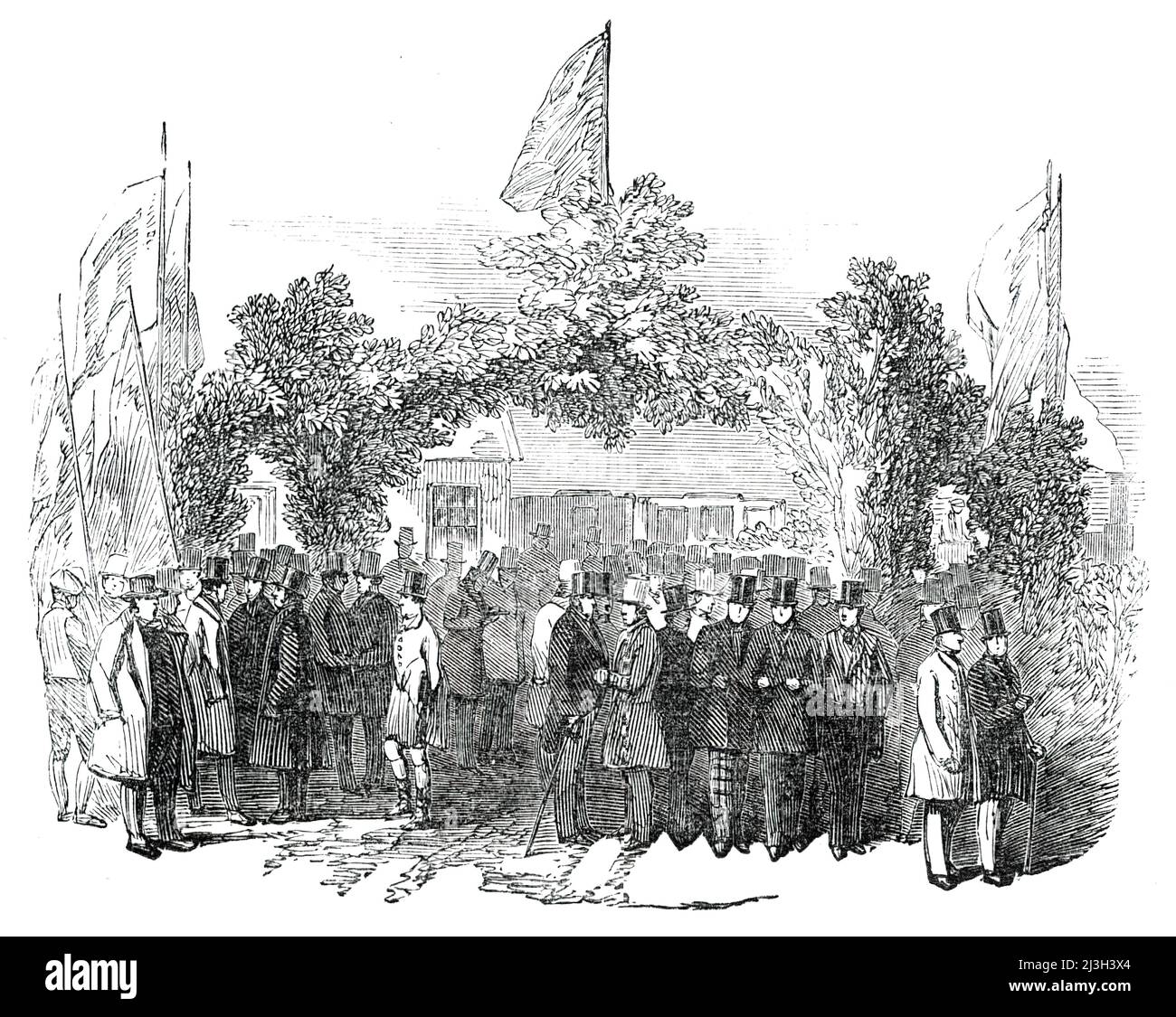 Apertura della ferrovia di Whitehaven e Furness Junction - Arch alla stazione di Broughton, 1850. 'Un arco trionfale di gusto era stato eretto di fronte alla stazione, composto da sempreverdi e ghirlande; e la strada che porta dalla stazione alla vecchia testa del re...era anche decorata con fiori e piante come la stagione poteva permettersi'. Da "Illustrated London News", 1850. Foto Stock