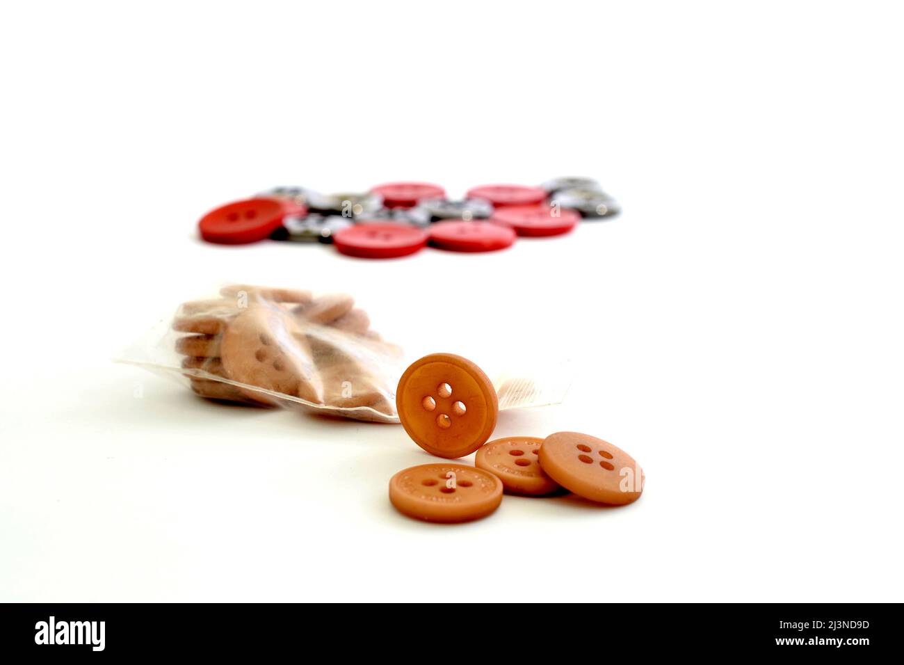 pulsante di sewings su sfondo bianco. Foto Stock