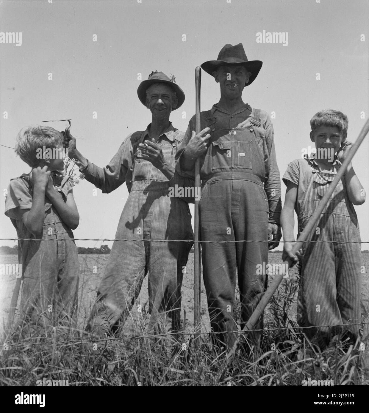 Coltivatori di cotone vicino a Oil City, Oklahoma, lavoratori di giorno. Carter County, Oklahoma. Foto Stock