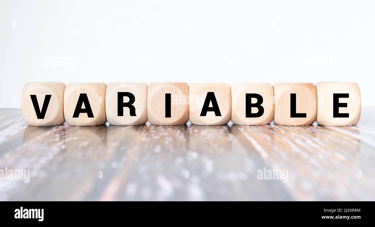 Testo DELLA VARIABILE sui cubi Foto Stock