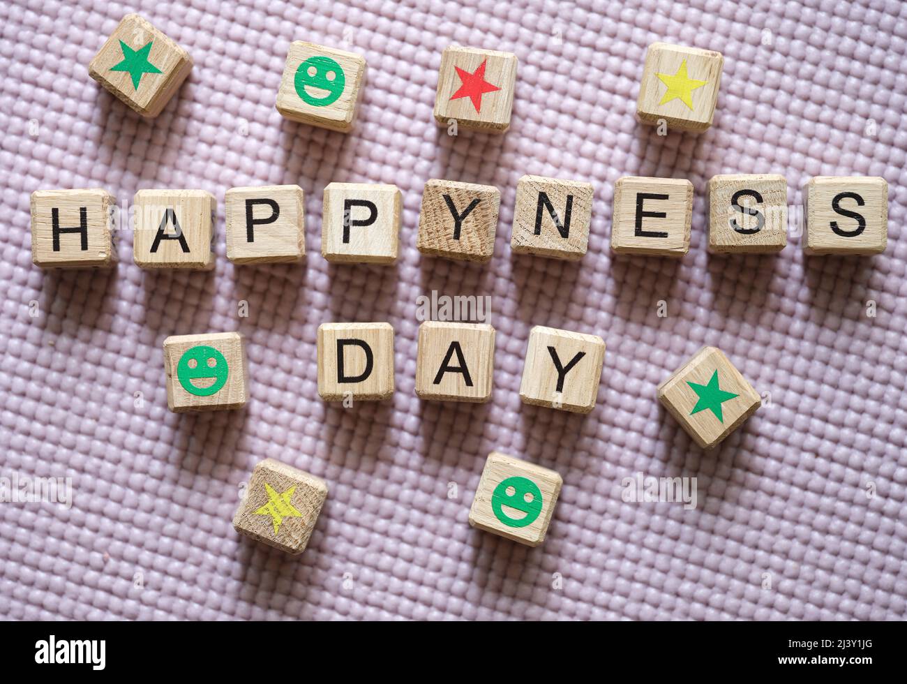 Texte sur Happy Day e asterischi e sorride a cubetti Foto Stock