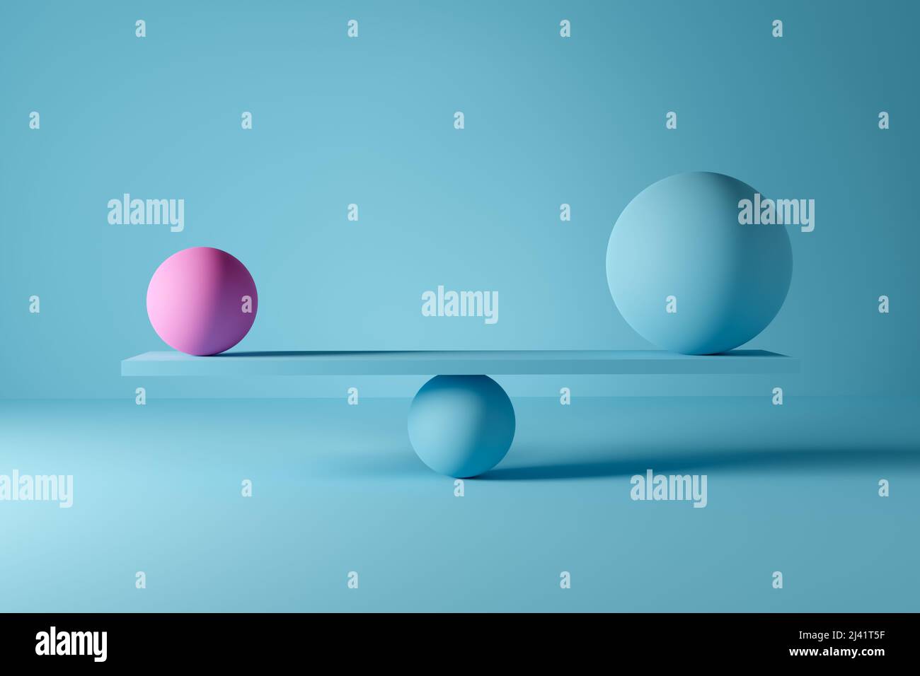 Grande sfera blu e piccola sfera rosa che si equilibrano su una scala. Power Balance o concetto di armonia. Foto Stock