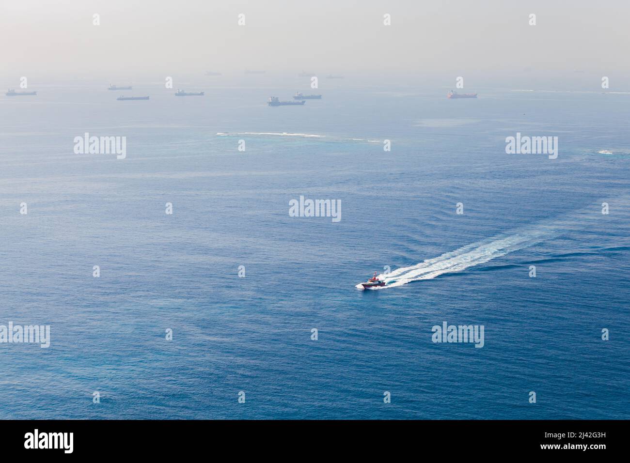 La barca pilota è sulla strada. Porto di Jeddah, Arabia Saudita Foto Stock