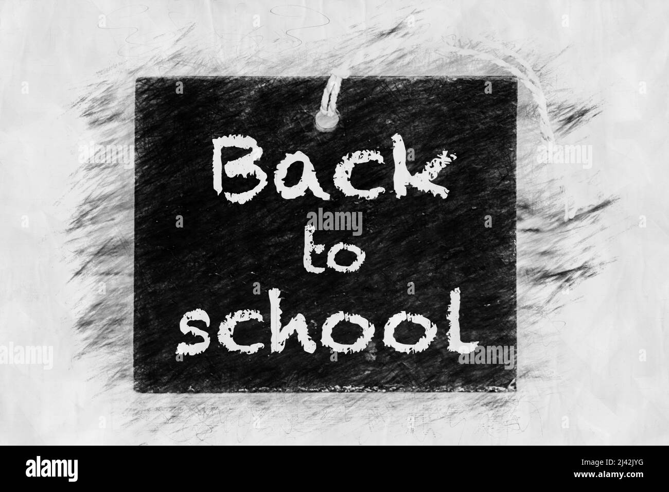 Le parole Back to School scritte in stile disegno a matita su lavagna Foto Stock