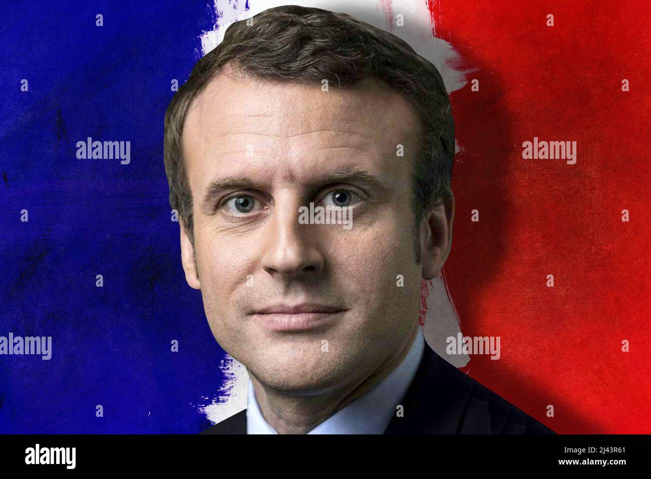 Emmanuel Macron con bandiera francese Foto Stock