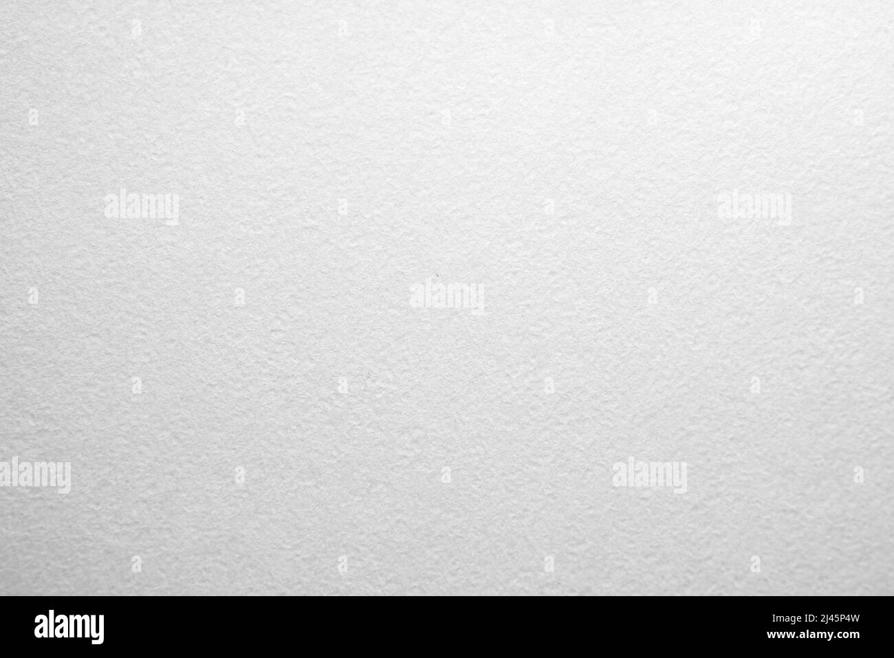 Grana carta bianca. Le trame possono essere utilizzate per lo sfondo del testo o di qualsiasi contenuto. Foto Stock