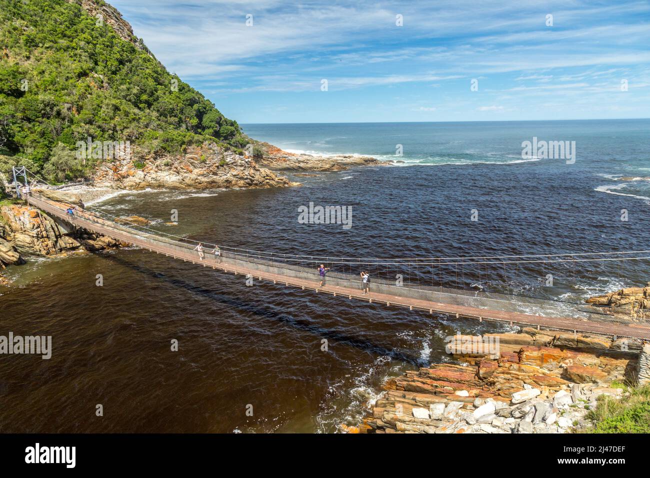 Suspension Bridge sulla foce del fiume tempeste nel Capo Occidentale del Sud Africa. Foto Stock