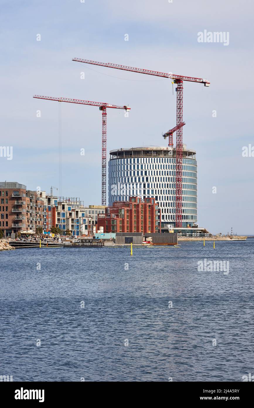 Costruzione dell'edificio circolare degli uffici 'Spidsen' a Nordø/Redmolen, Copenaghen, Danimarca Foto Stock