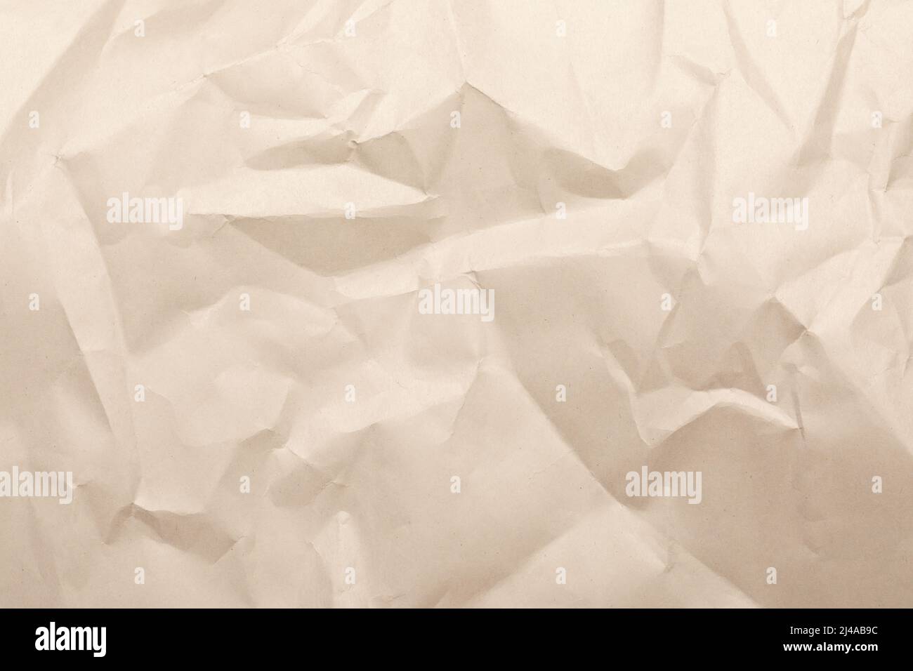 Foglio di kraft marrone rugoso fatto di carta riciclata con tessitura e dettagli Foto Stock