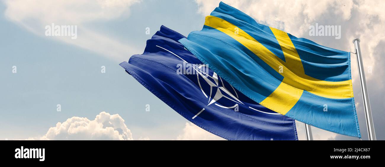 La bandiera svedese .Svezia entra a far parte dell'Organizzazione del Trattato dell'Atlantico settentrionale Foto Stock