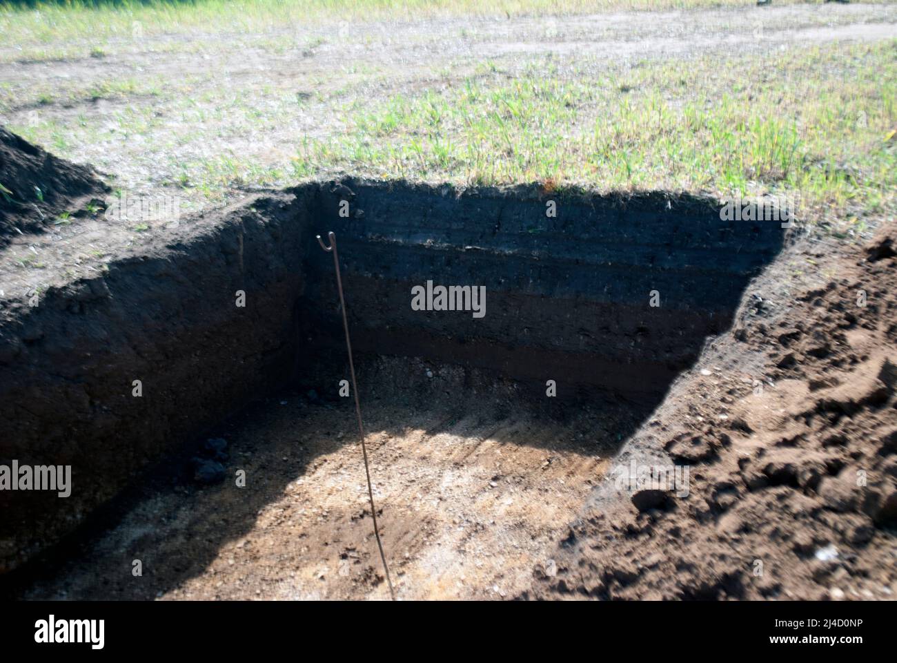 Trincee scavate in campo per indagine archeologica vicino al villaggio di Ruskington, Sleaford, Lincolnshire, Inghilterra, Regno Unito Foto Stock