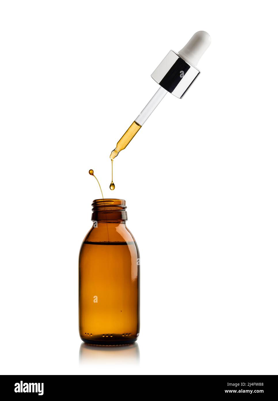 Flacone cosmetico di olio essenziale con pipetta di olio gocciolante Foto Stock