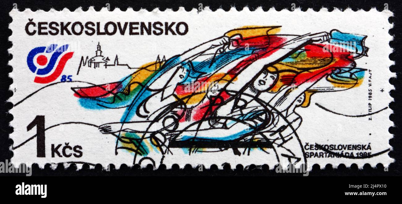 CECOSLOVACCHIA - CIRCA 1985: Un francobollo stampato in Cecoslovacchia mostra esercizi ritmici del pavimento di Ginnastica, Spartakiad ’85, Stadio Strahov, Praga, Foto Stock