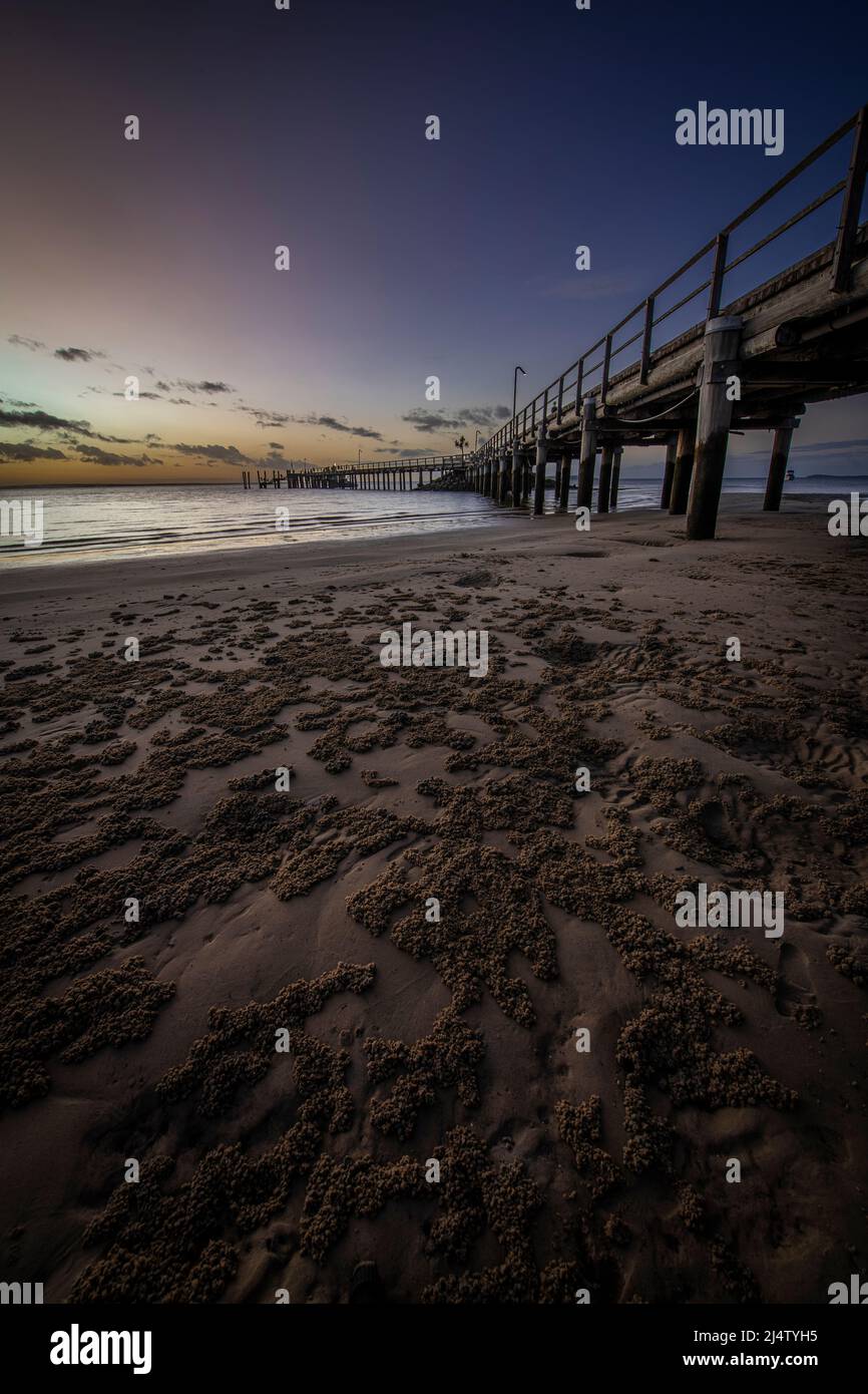 Molo di Kingfisher Bay al tramonto. Fraser Island, Queensland, Australia Foto Stock