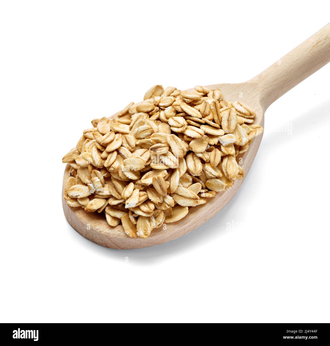 oat cibo cereali grano sano farinata d'avena colazione biologica flake ingrediente dieta semi pasto cucchiaio di legno Foto Stock