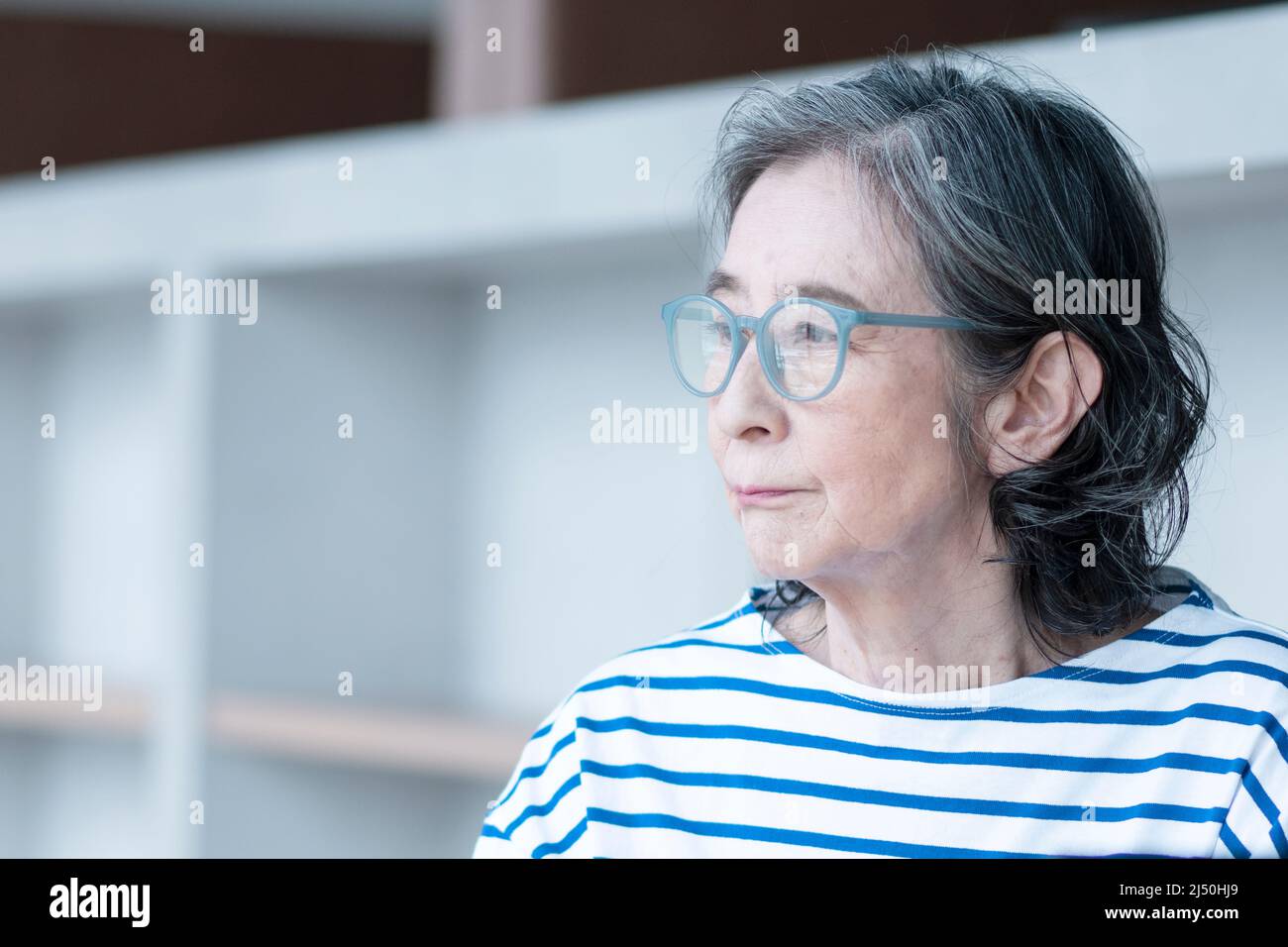 Donna maggiore Foto Stock