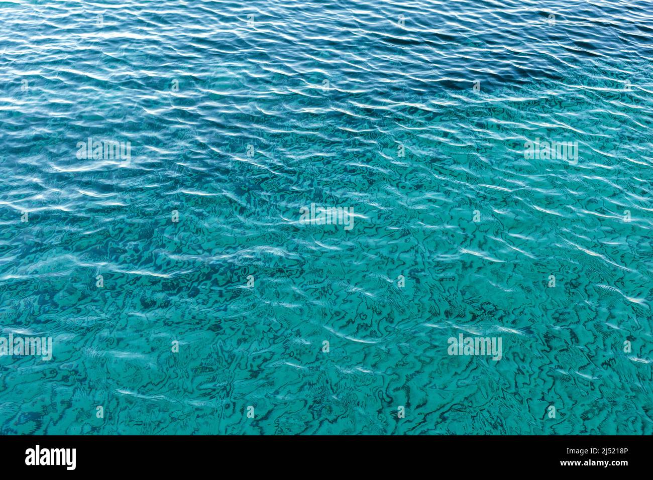 Sfondo astratto della superficie del mare, colori blu, verde e turchese Foto Stock