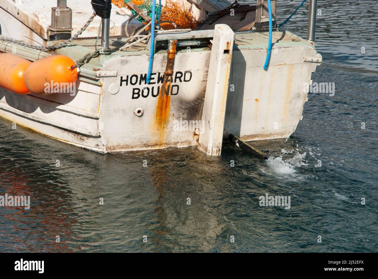 Barca con il nome "Homeward Bound" Foto Stock