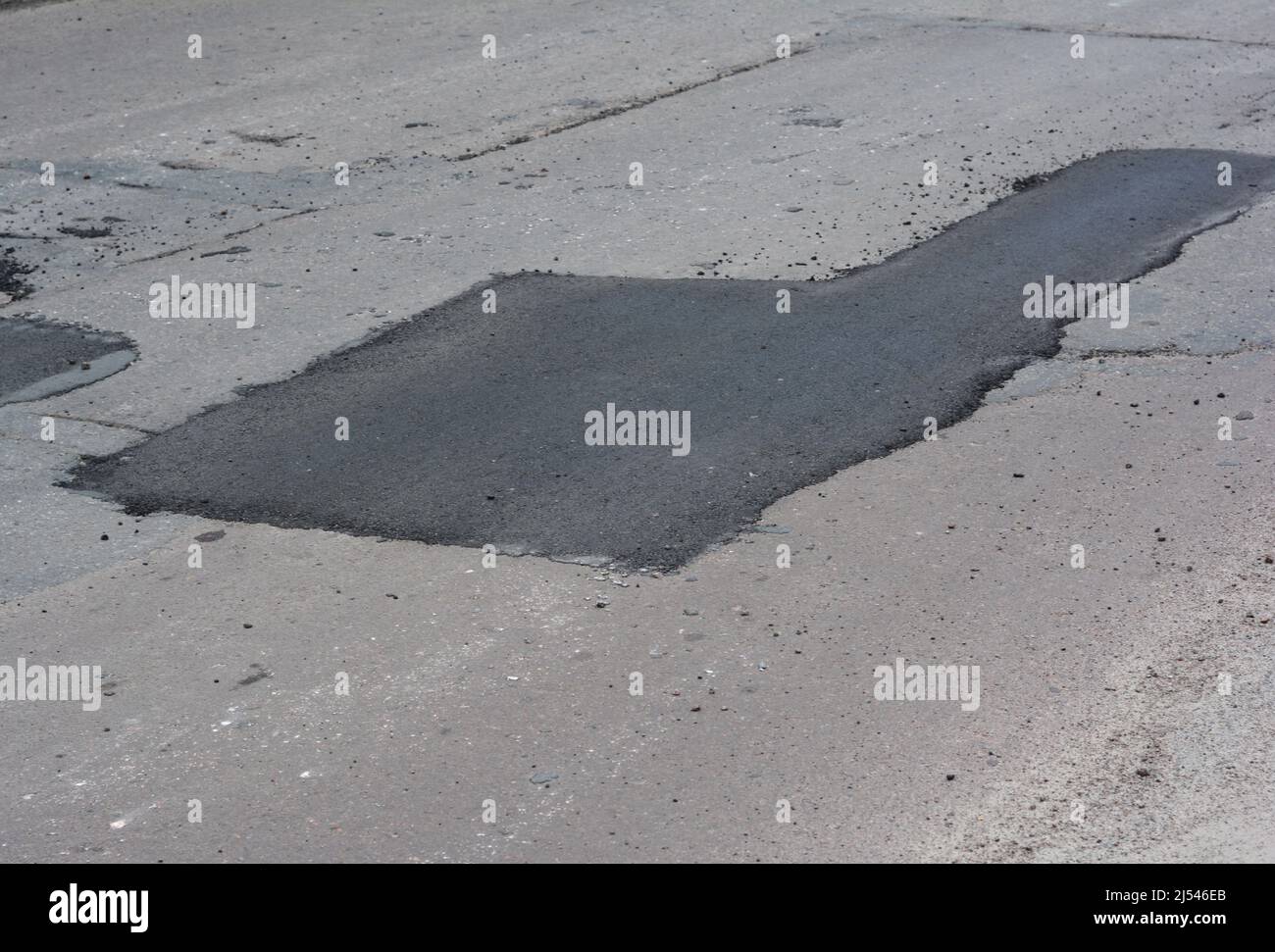 Pavimentazione in asfalto. Asfaltatrici, New Asphalt previsto. Pavimentazione in asfalto - costruzione di nuove strade. Foto Stock