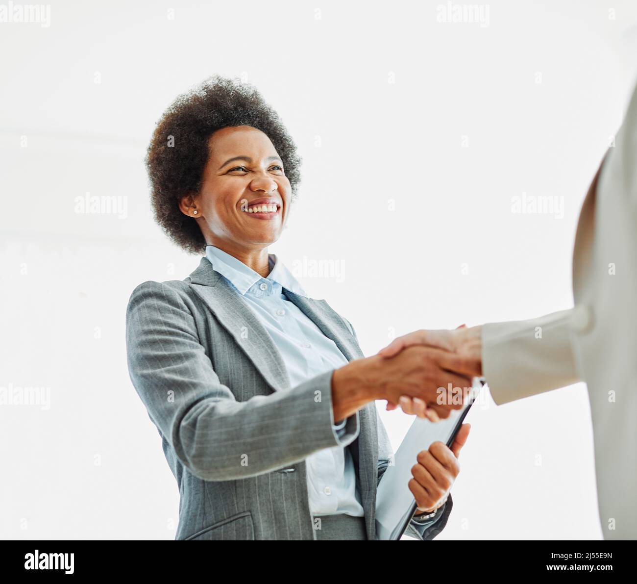 business businesswoman handshake donna mano ufficio riunione squadra accordo di successo Foto Stock