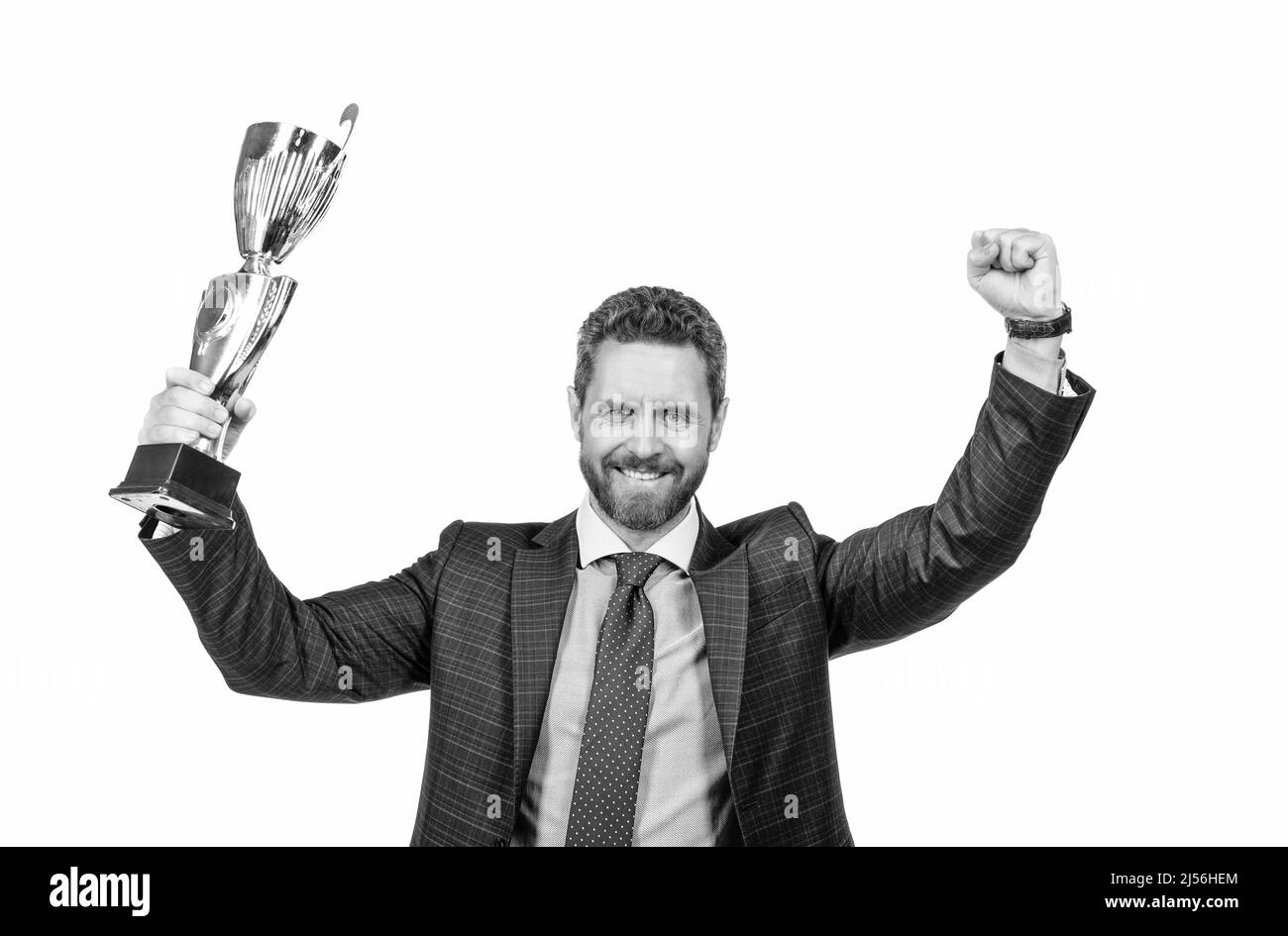 Leader aziendale di successo celebrare il successo tenendo Golden Cup vincere mano gesto, leadership Foto Stock