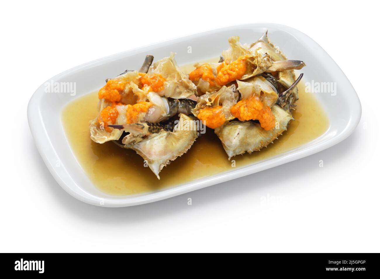 Ganjang gejang (granchi di gazami crudi marinati in salsa di soia speziata dolce), cibo coreano isolato su sfondo bianco Foto Stock
