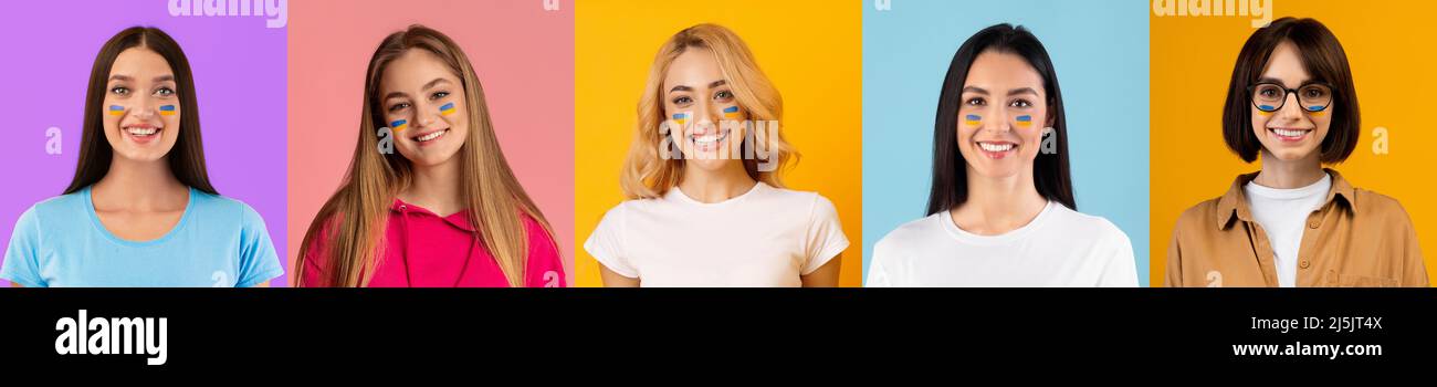 Ritratti di belle giovani donne con bandiera blu e gialla Foto Stock
