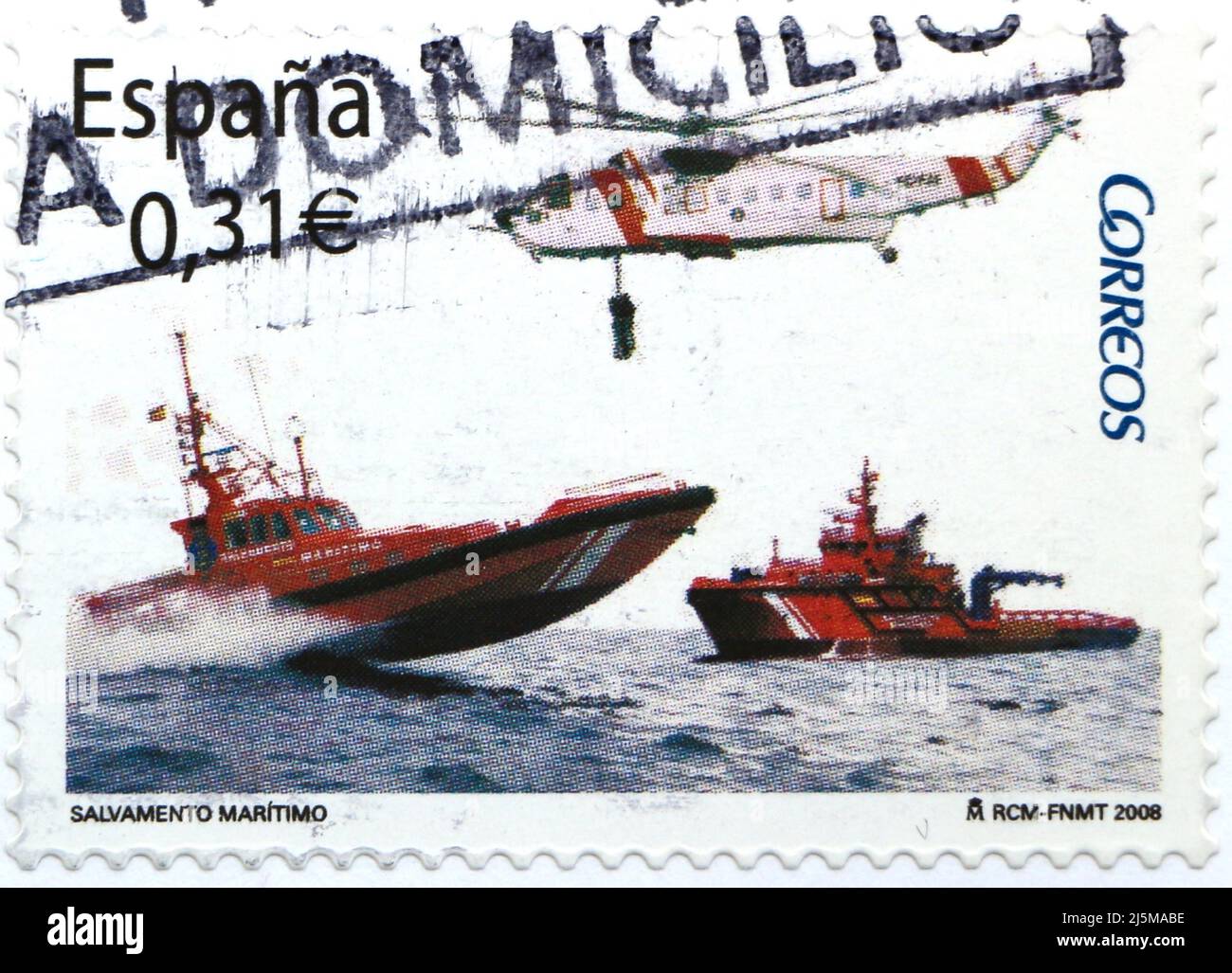 Foto di un francobollo spagnolo con un'immagine della guardia costiera salvataggio elicottero e barche 2008 Foto Stock