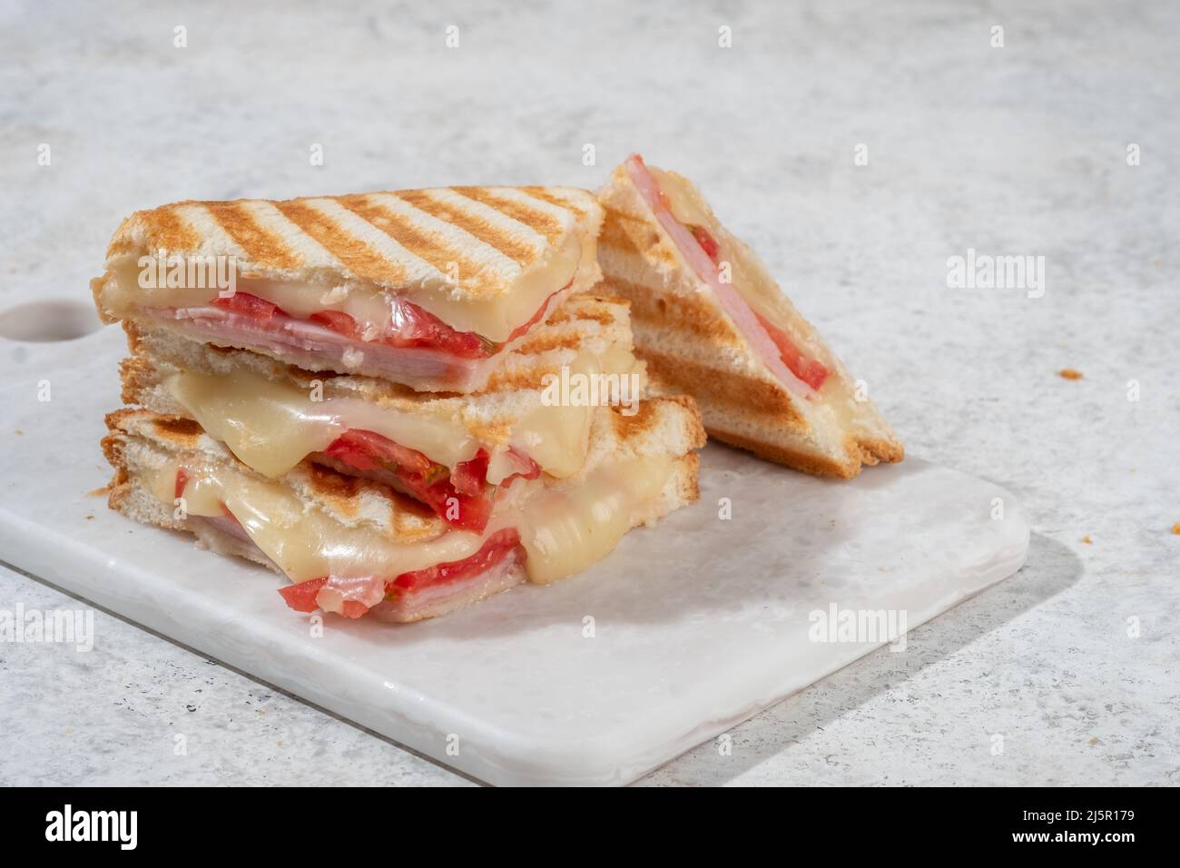 Grigliata di prosciutto e formaggio panino Foto Stock