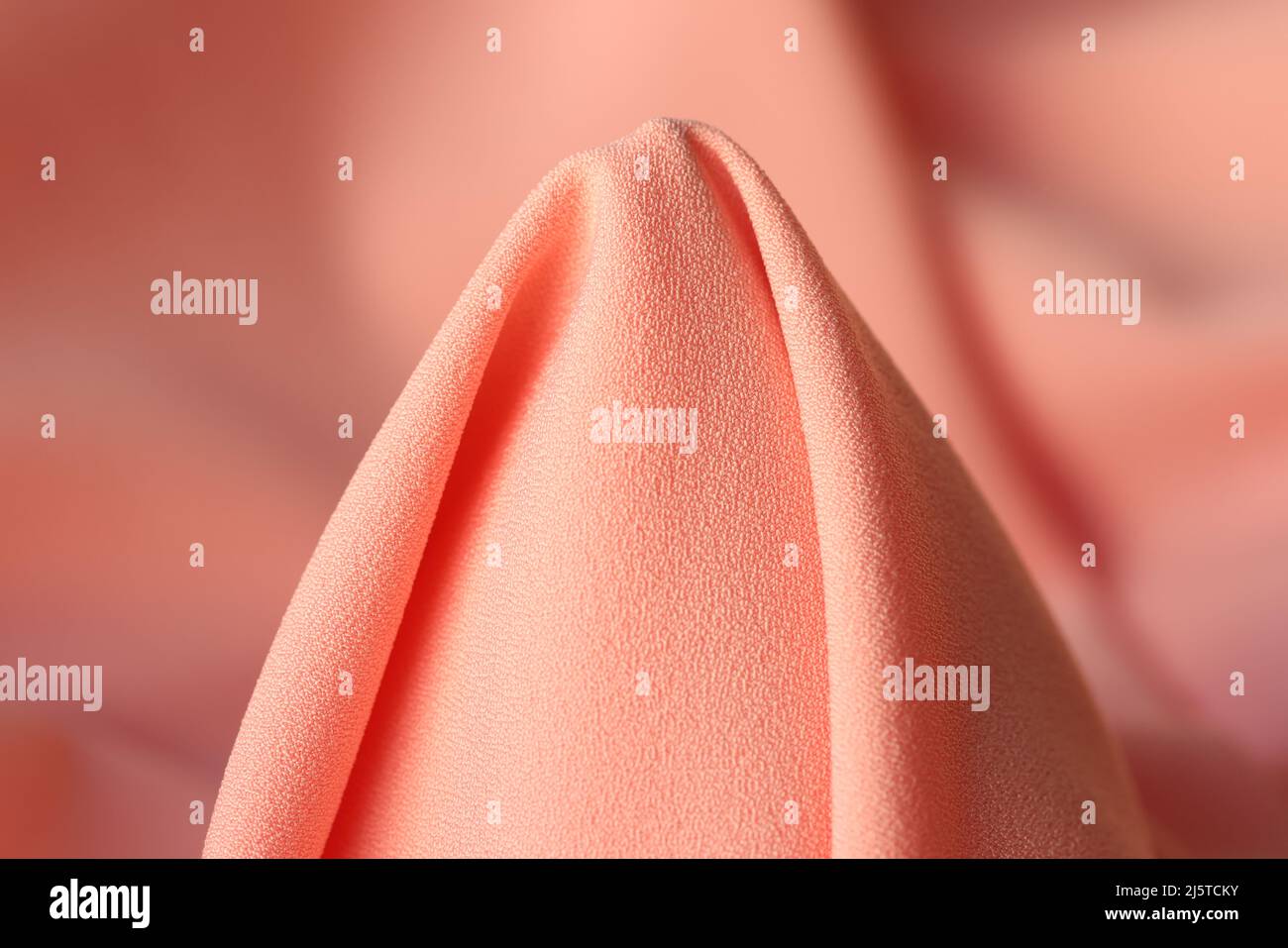 Tessuto rosa pallido a forma di cono Foto Stock