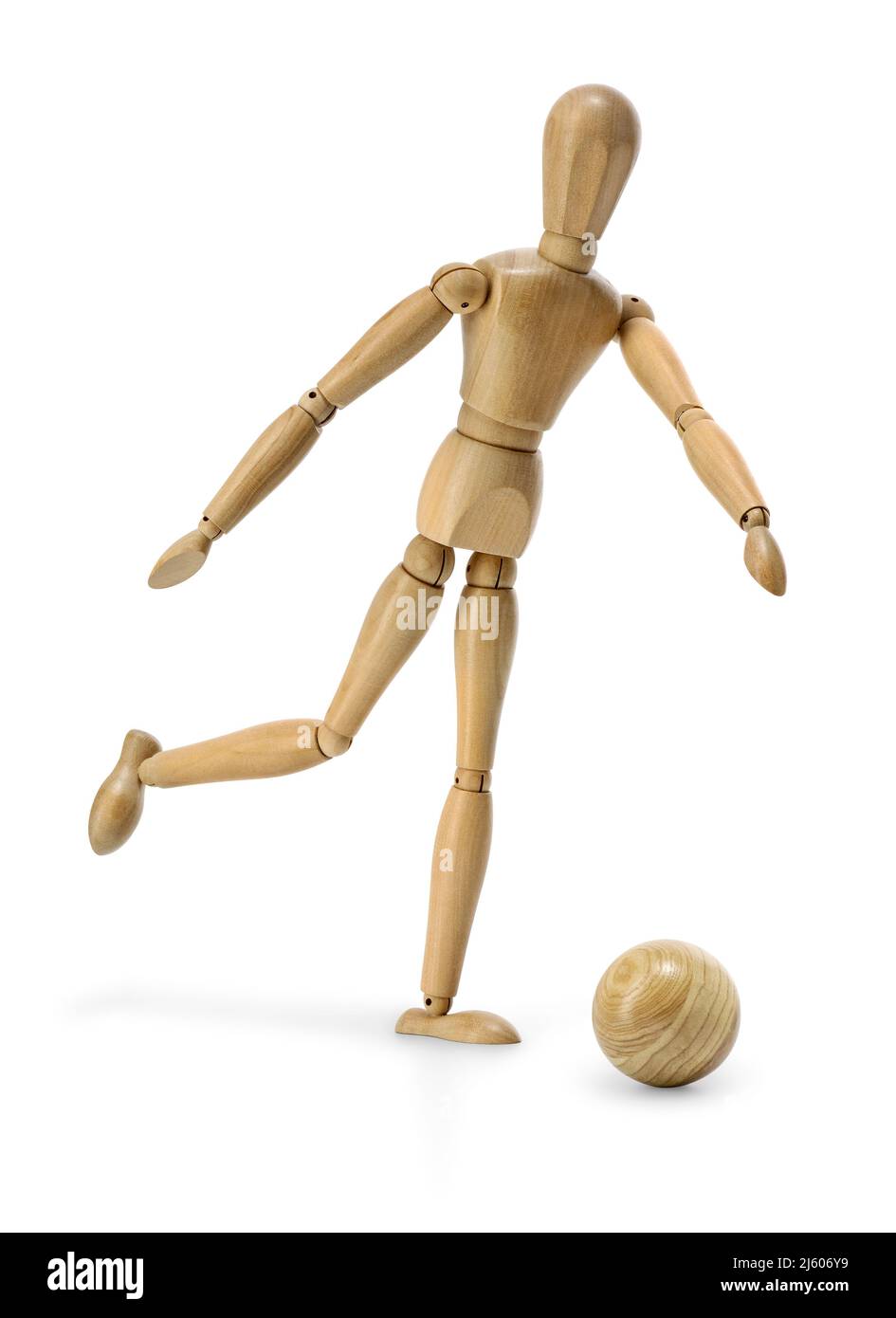 Un manichino in legno gioca a calcio Foto Stock