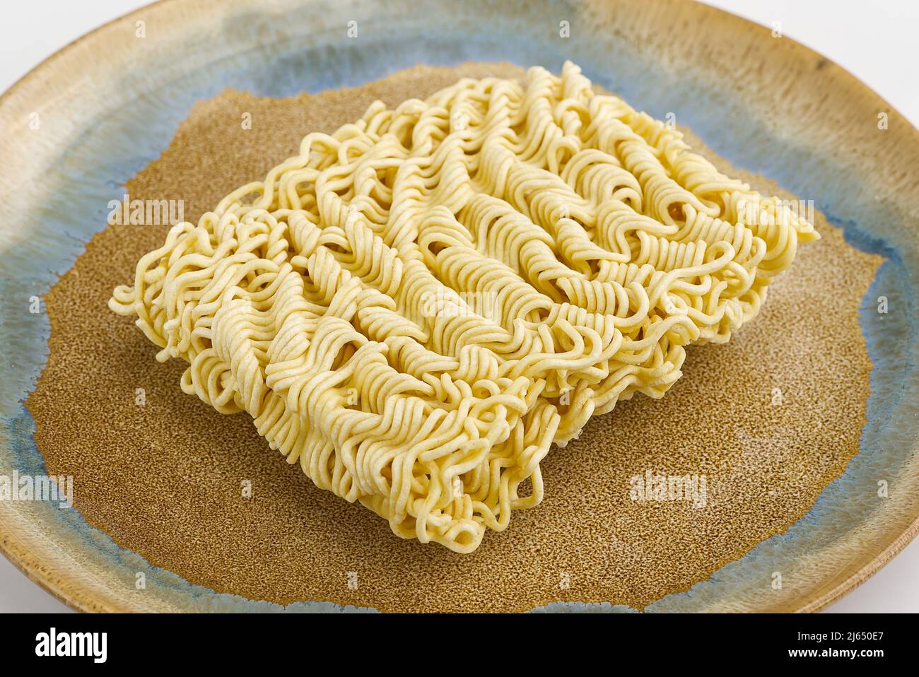 Spaghetti istantanei grezzi. Ravvicinato texture spaghetti istantanei per lo sfondo. Foto Stock