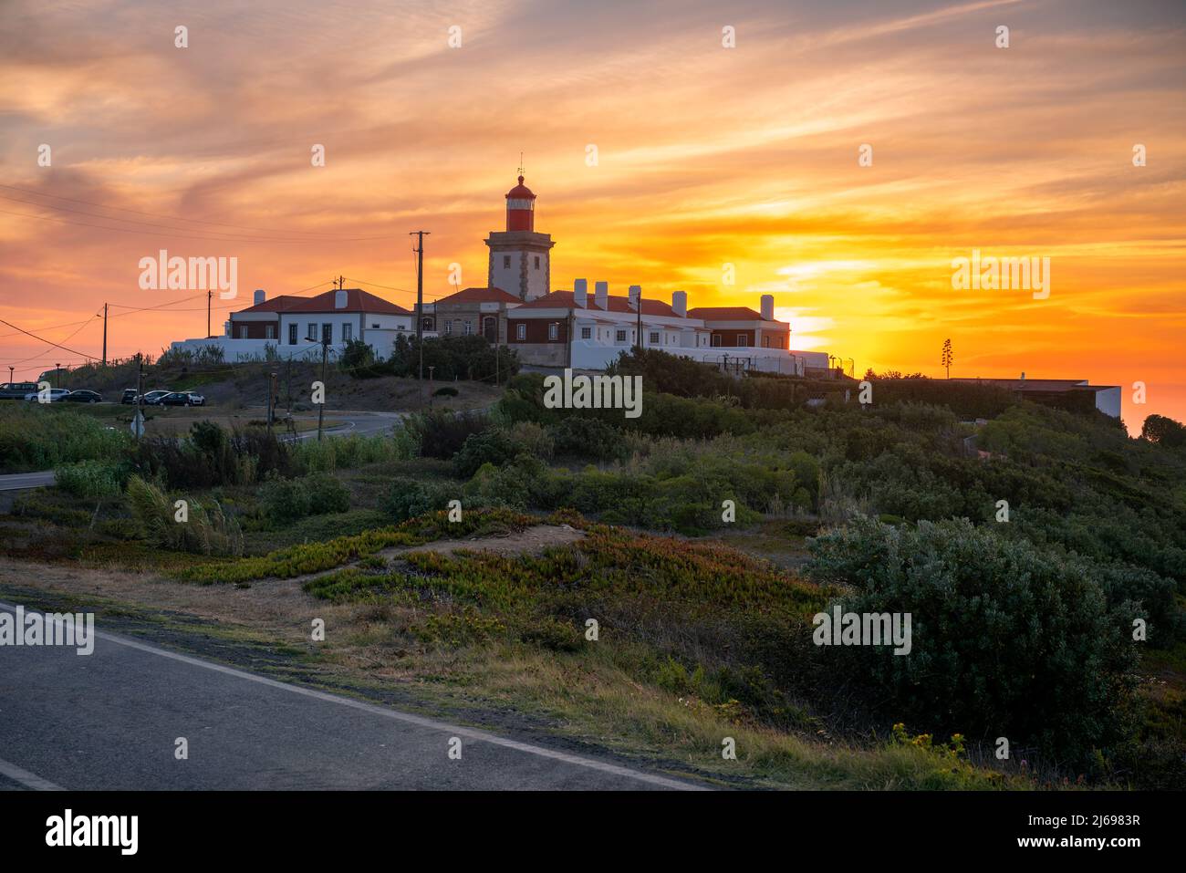 Roca Capo (Cabo da Roca) Faro, punto più occidentale d'Europa, al tramonto, Portogallo Foto Stock