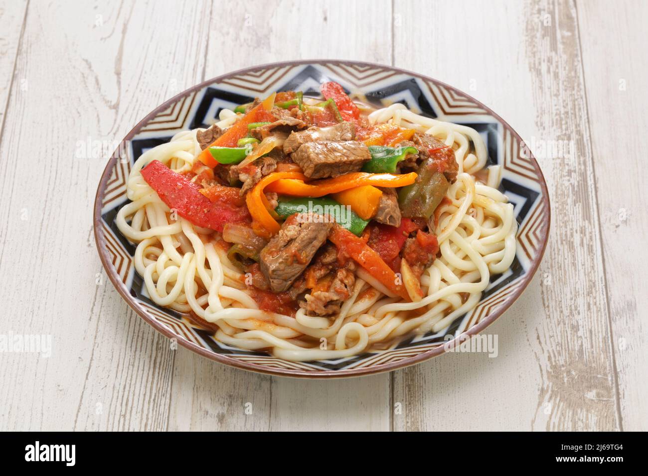 Laghman, piatto di spaghetti tirati a mano con carne di agnello e verdure, cucina Uyghur Foto Stock