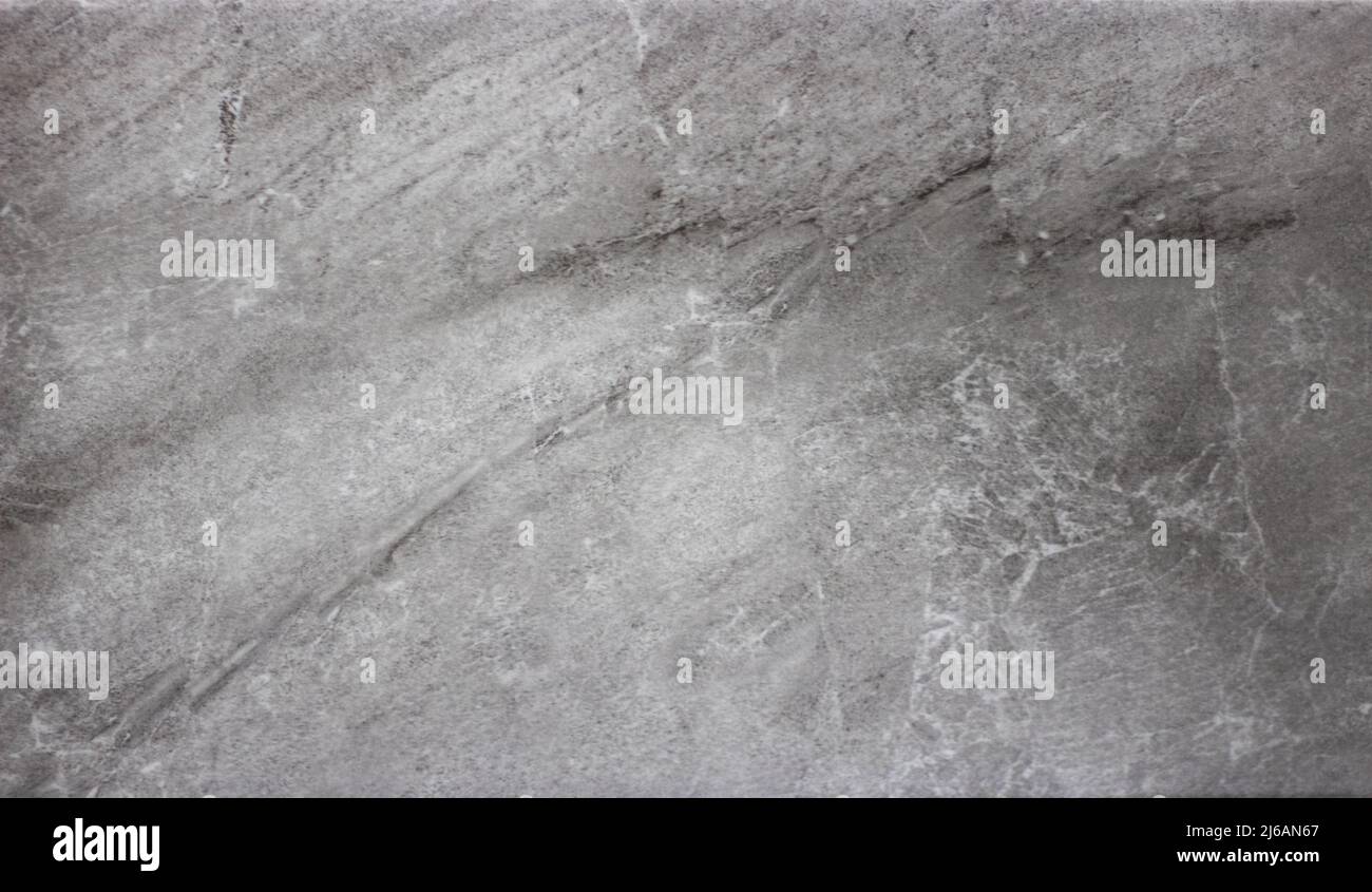 Sfondo di piastrelle di marmo grigio in primo piano. Struttura in marmo grigio Foto Stock