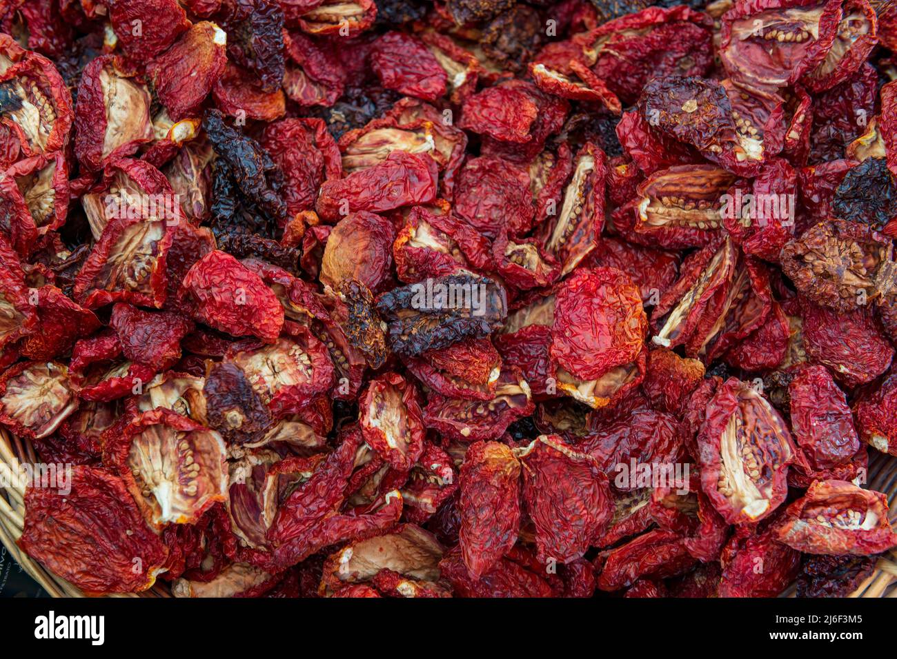 Pomodori secchi sfondo. Deliziosa cucina italiana. Foto Stock