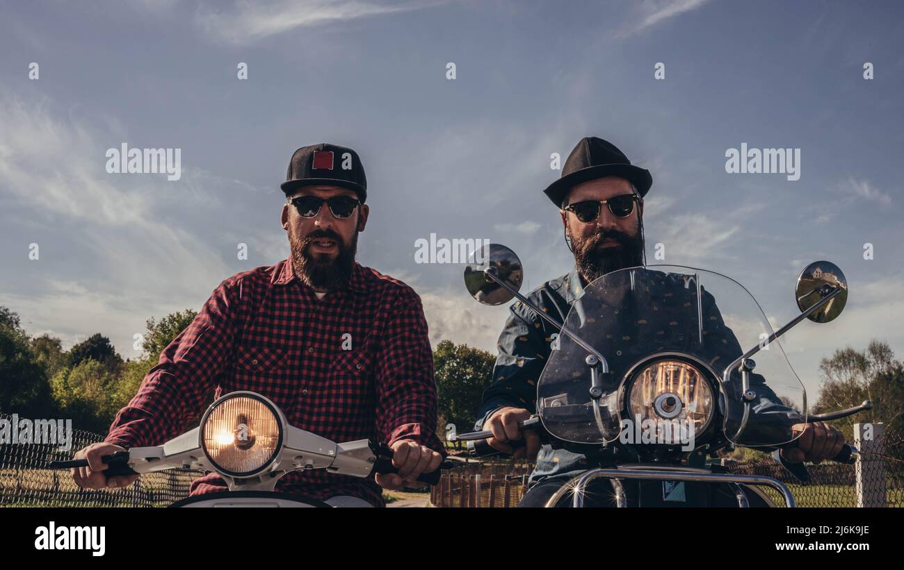 uomini e motociclette Foto Stock
