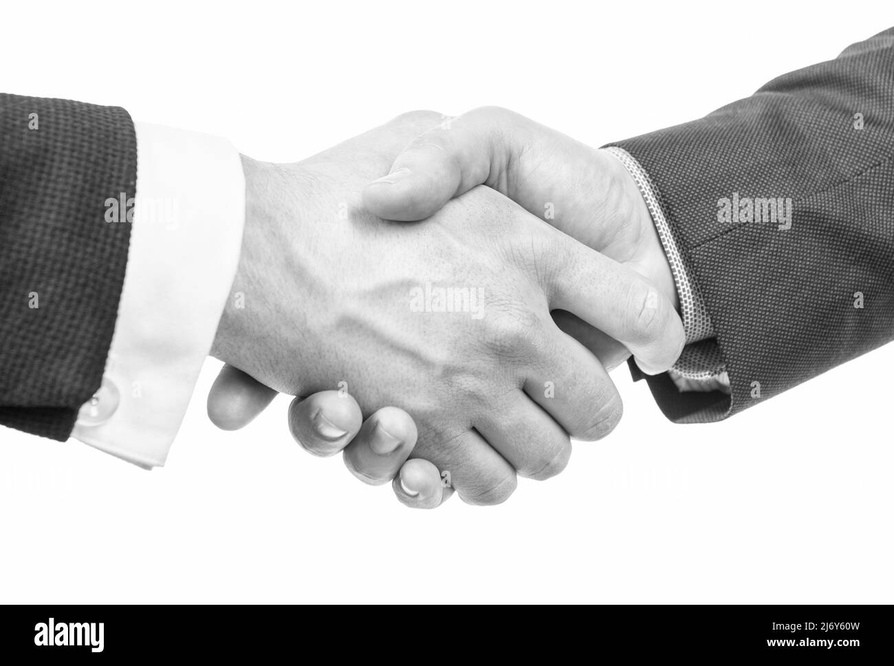 Le mani maschili scuotono come etichetta aziendale formale di saluto isolato su bianco, stretta di mano Foto Stock