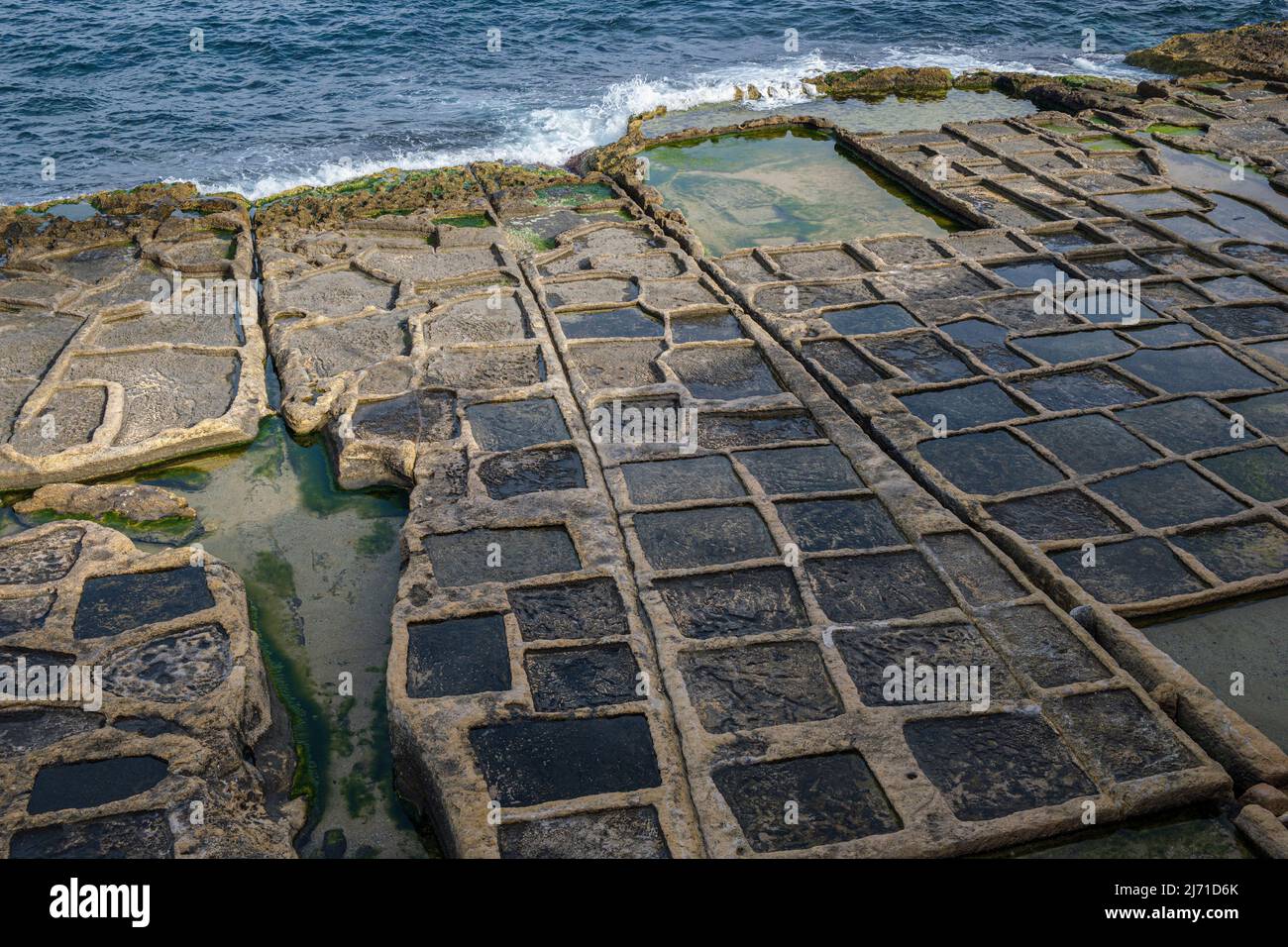 Zonqor Point Salt Pans a Marsaskala che si pensa siano datati dai tempi romani, Malta Foto Stock