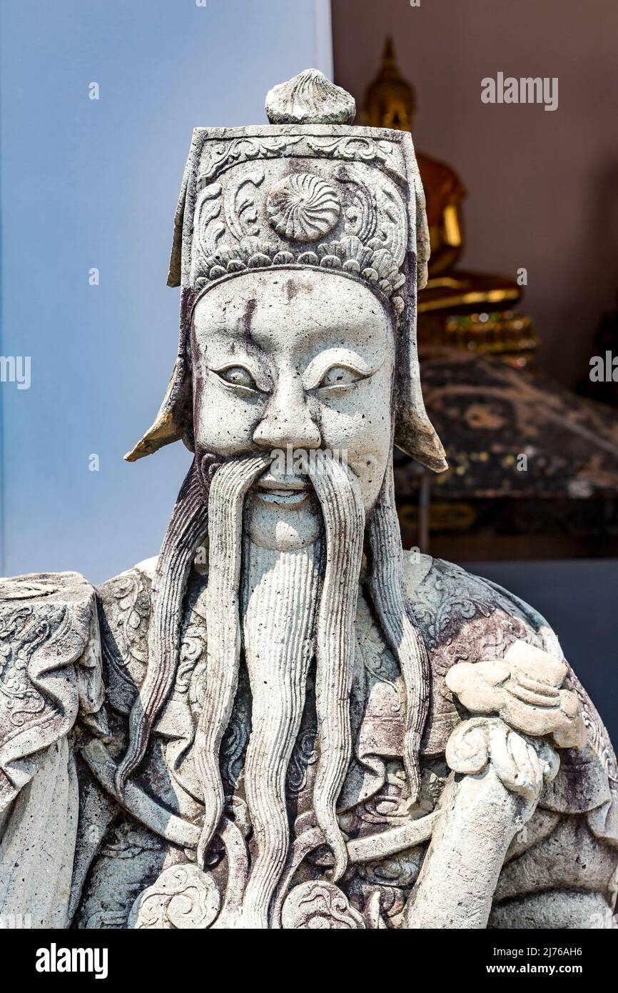 Figura cinese in pietra, custode del tempio, complesso del tempio Wat Pho, tempio del Buddha reclinato, Bangkok, Thailandia, Asia Foto Stock